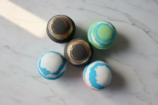 Large round bath bombs in various colour combinations